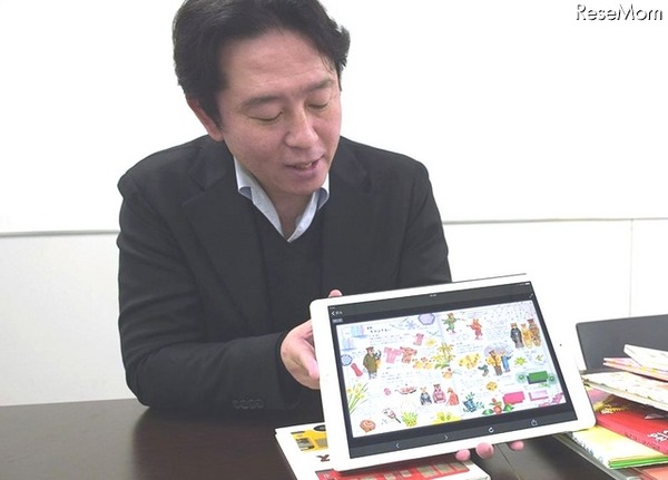 実際の読み放題サービス画面の説明を行う絵本ナビ代表取締役社長の金柿氏