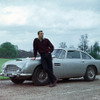 1964年　「007 ゴールドフィンガー」ボンドカーの代名詞とも言える『アストンマーティンDB5』。今では名車と讃えられるこの車は、これ以降計6作品に登場することになる。
